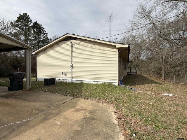 view of side of property with a patio area