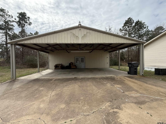 view of parking / parking lot with a carport