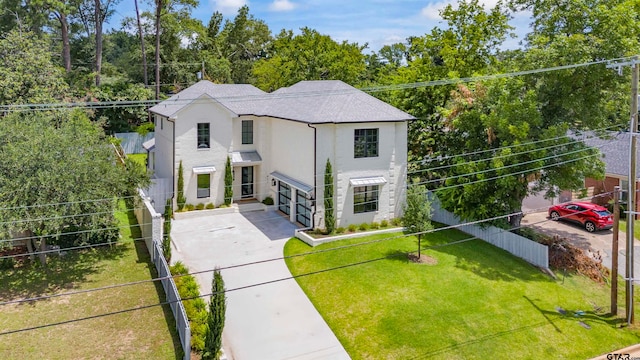 view of front of home with a front lawn