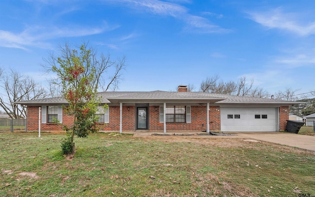 single story home featuring a front yard and a garage