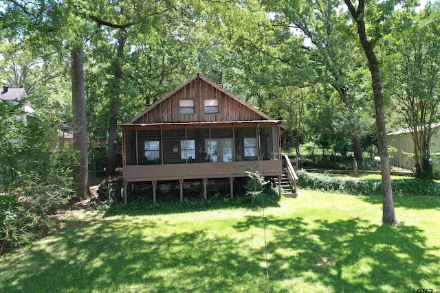 17044 Deer Run Dr, Bullard, TX 75757 - back of house featuring a sunroom, a lawn, stairs, and a forest view