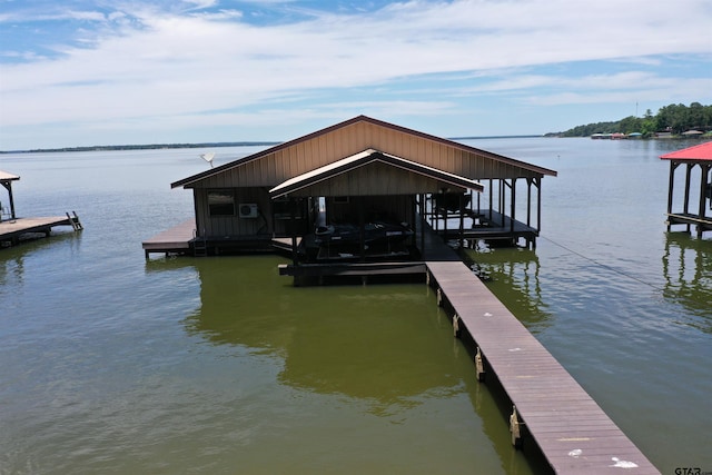 17044 Deer Run Dr, Bullard, TX 75757 - dock with boat lift and a water view