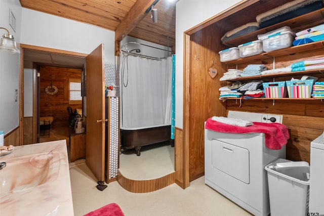 17044 Deer Run Dr, Bullard, TX 75757 - washroom with washer / clothes dryer, wooden walls, and wood ceiling