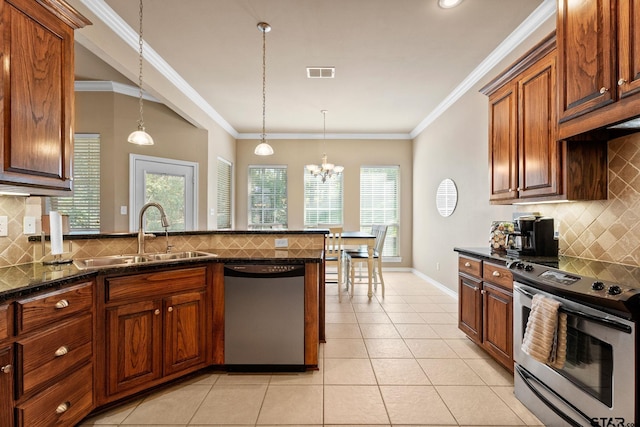 kitchen featuring ornamental molding, sink, appliances with stainless steel finishes, and tasteful backsplash