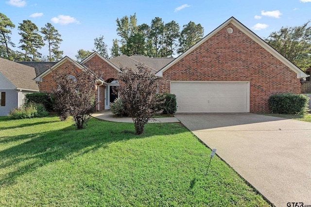 view of front facade featuring a garage and a front lawn