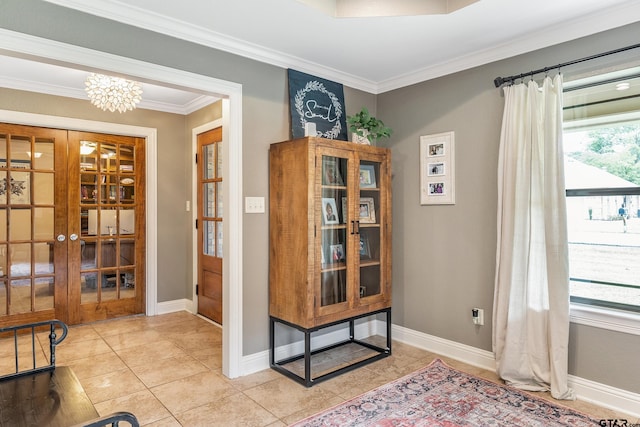 interior space with ornamental molding, french doors, a notable chandelier, and light tile patterned floors