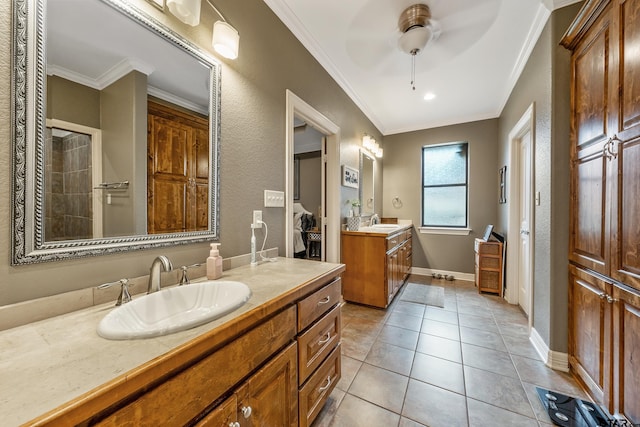 bathroom with vanity, tile patterned floors, ceiling fan, and crown molding