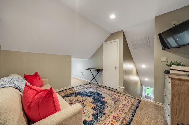 living area featuring vaulted ceiling and carpet floors