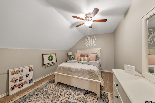 bedroom with lofted ceiling, carpet flooring, and ceiling fan