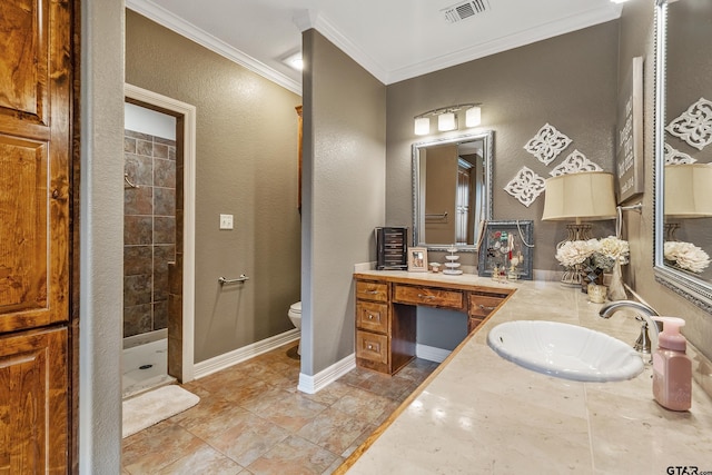 bathroom with toilet, tile patterned flooring, a tile shower, vanity, and crown molding