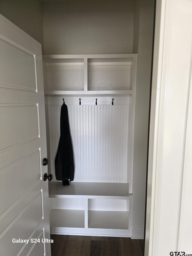 mudroom with wood finished floors