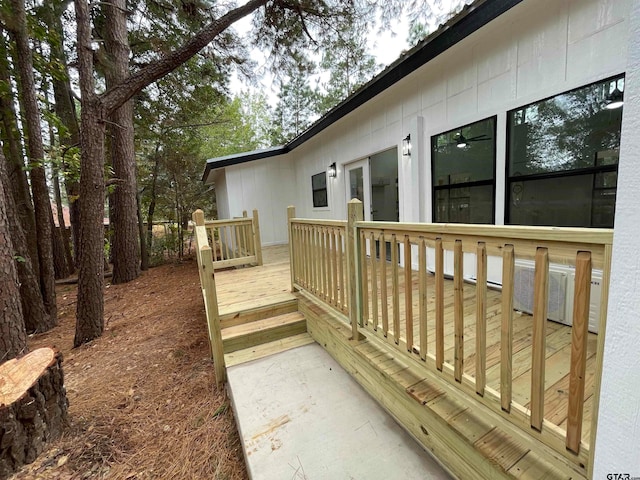 view of side of property with a deck