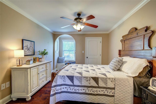 356 County Road 1439, Sulphur Springs, TX 75482 - bedroom with dark wood finished floors, a ceiling fan, ornamental molding, arched walkways, and baseboards