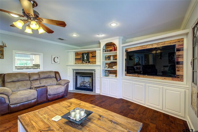 356 County Road 1439, Sulphur Springs, TX 75482 - living area with crown molding, ceiling fan, a fireplace, dark wood-style flooring, and visible vents