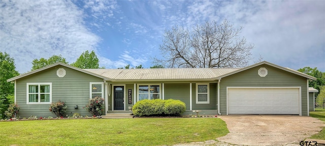 356 County Road 1439, Sulphur Springs, TX 75482 - single story home featuring a garage, a front lawn, concrete driveway, and metal roof