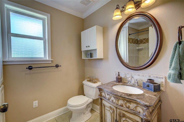356 County Road 1439, Sulphur Springs, TX 75482 - bathroom with visible vents, toilet, vanity, crown molding, and baseboards