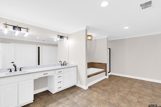 bathroom with a washtub, vanity, and ornamental molding