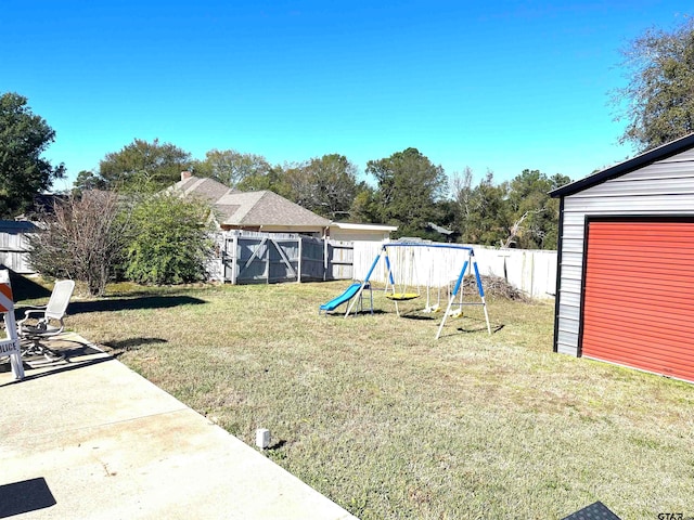 view of yard with a playground