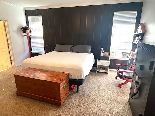 carpeted bedroom with crown molding