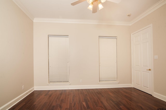 unfurnished room featuring ornamental molding, ceiling fan, and dark wood-type flooring