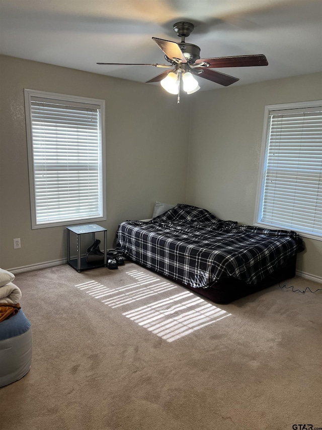 bedroom featuring carpet floors and ceiling fan