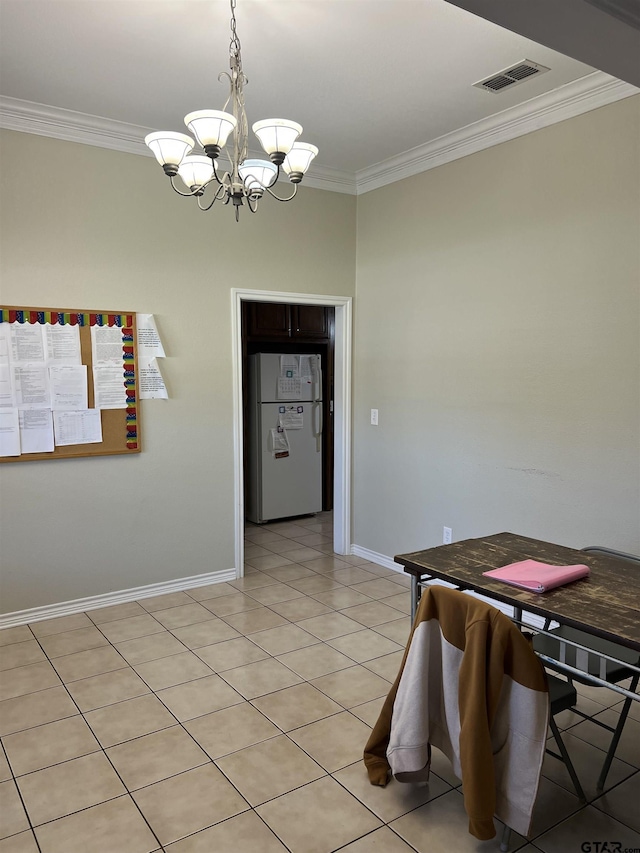 unfurnished dining area with ornamental molding, a chandelier, and light tile patterned floors