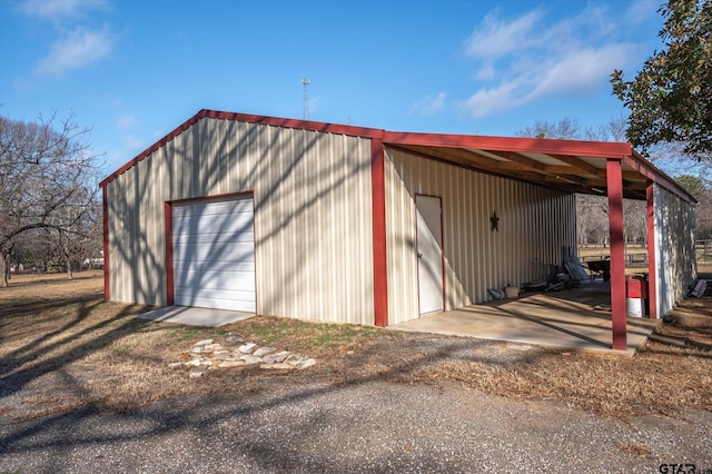 view of outbuilding with a garage