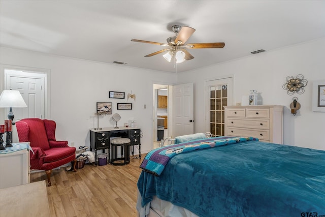 bedroom featuring ceiling fan and light hardwood / wood-style flooring