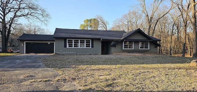 204 Lakeside Dr, West Tawakoni, TX 75474 - view of front of property with a garage and driveway
