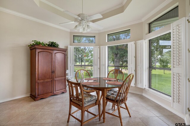 215 S Bay Dr, Bullard, TX 75757 - dining area featuring light tile patterned floors, a tray ceiling, a ceiling fan, crown molding, and plenty of natural light