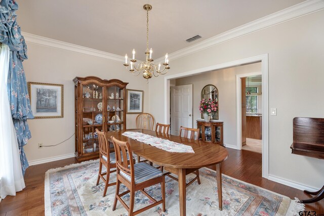 215 S Bay Dr, Bullard, TX 75757 - dining space featuring crown molding, a chandelier, and wood finished floors