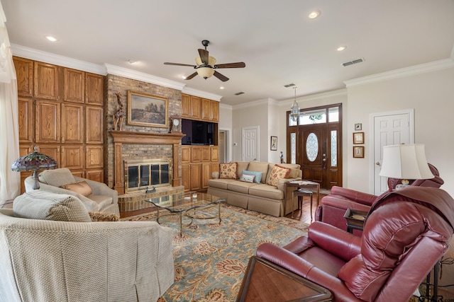 215 S Bay Dr, Bullard, TX 75757 - living room with ceiling fan, wood finished floors, crown molding, a brick fireplace, and recessed lighting