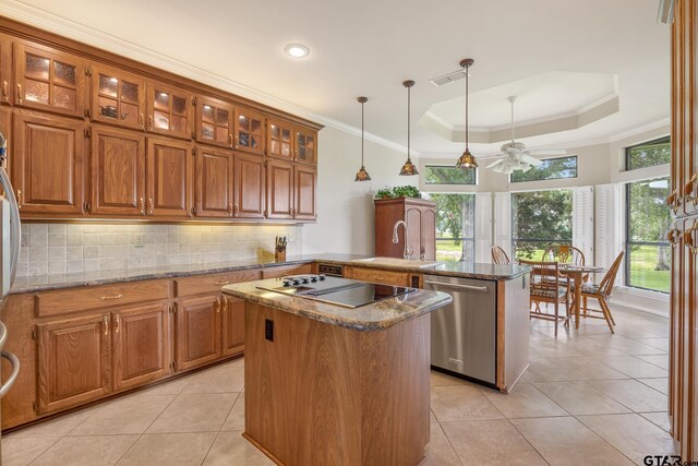 215 S Bay Dr, Bullard, TX 75757 - kitchen with dishwasher, black electric stovetop, a peninsula, a kitchen island, and light tile patterned floors