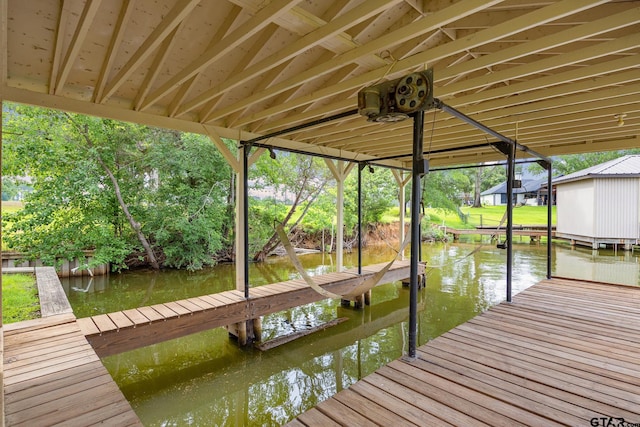 215 S Bay Dr, Bullard, TX 75757 - dock area with a water view, boat lift, and view of scattered trees