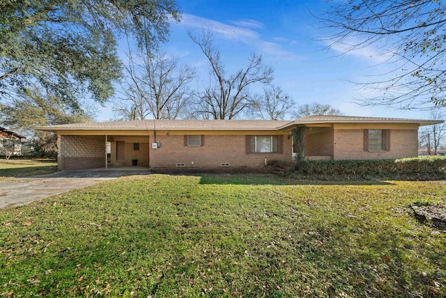 single story home featuring a carport and a front yard