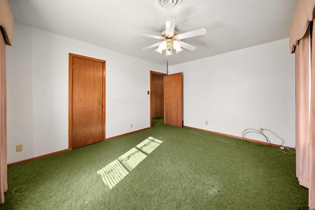 unfurnished bedroom with carpet flooring and ceiling fan