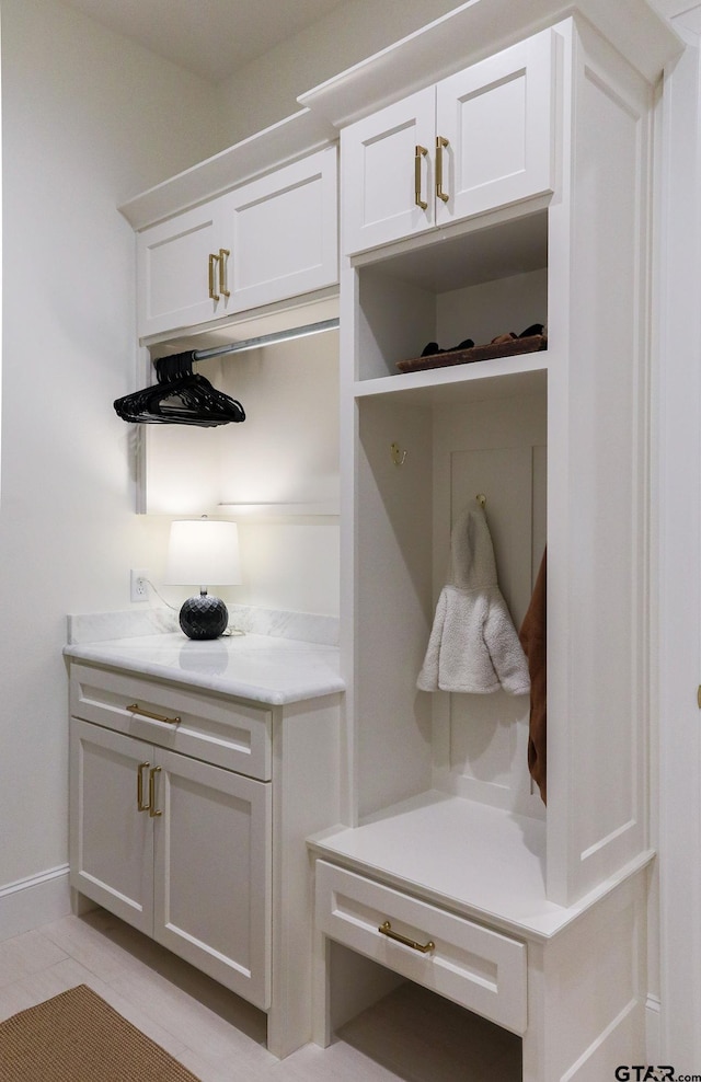 mudroom featuring baseboards