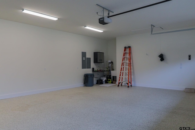 garage featuring baseboards, electric panel, and a garage door opener