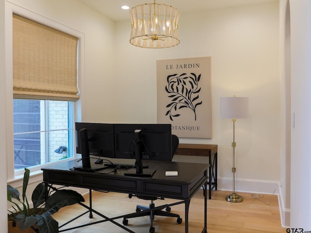 home office with recessed lighting, a notable chandelier, baseboards, and wood finished floors