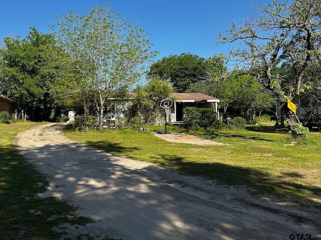 surrounding community featuring a yard