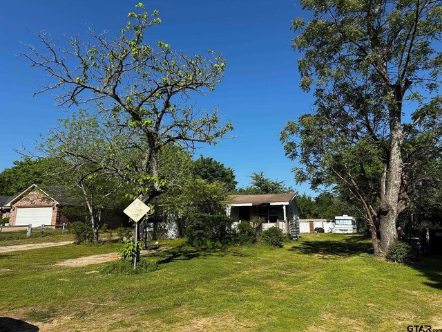 view of front of home with a front yard