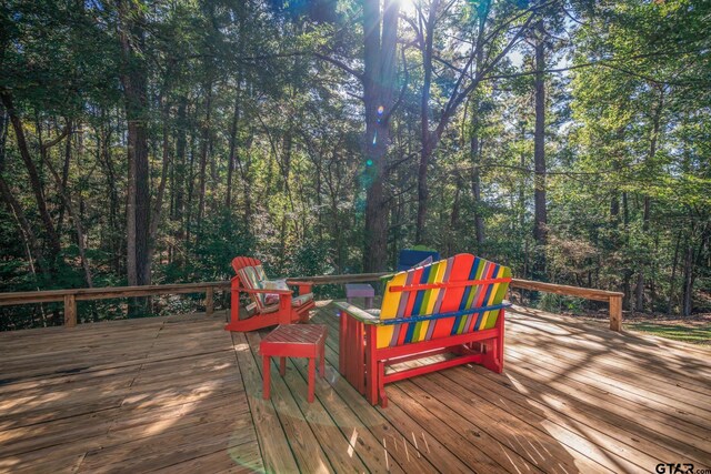 431 Gifford St, Rusk, TX 75785 - deck featuring a wooded view