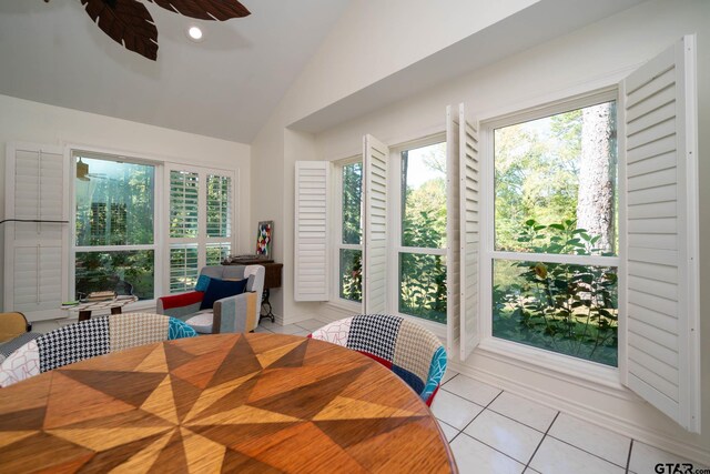 431 Gifford St, Rusk, TX 75785 - dining space with light tile patterned floors, lofted ceiling, and ceiling fan