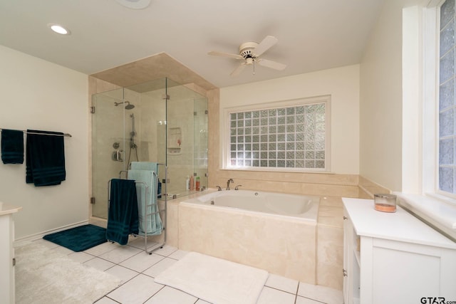 431 Gifford St, Rusk, TX 75785 - bathroom with a garden tub, a shower stall, tile patterned flooring, a ceiling fan, and vanity
