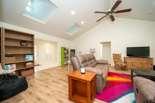 431 Gifford St, Rusk, TX 75785 - living area with a skylight, wood finished floors, high vaulted ceiling, ceiling fan, and recessed lighting