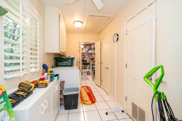 431 Gifford St, Rusk, TX 75785 - kitchen with light tile patterned floors, light countertops, ceiling fan, and white cabinets
