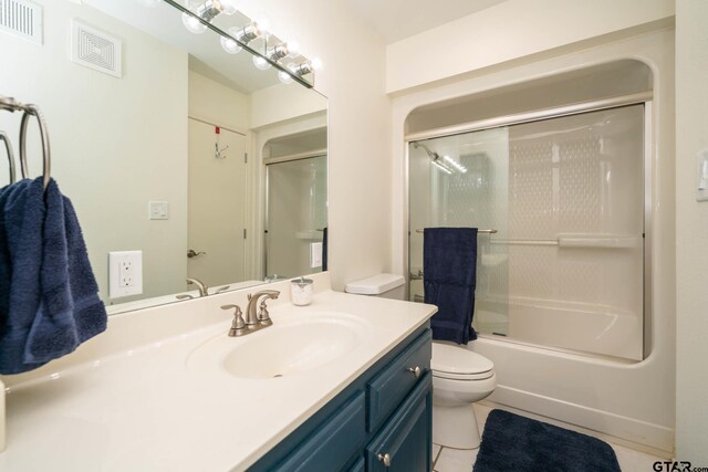 431 Gifford St, Rusk, TX 75785 - bathroom featuring vanity, tile patterned flooring, and enclosed tub / shower combo