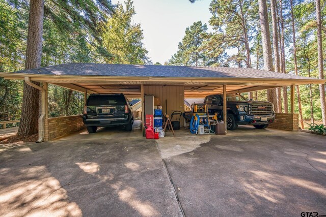 431 Gifford St, Rusk, TX 75785 - view of parking / parking lot featuring concrete driveway and a detached carport