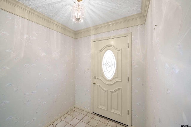 entrance foyer with light tile patterned floors and baseboards