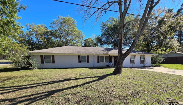 ranch-style house with a front yard